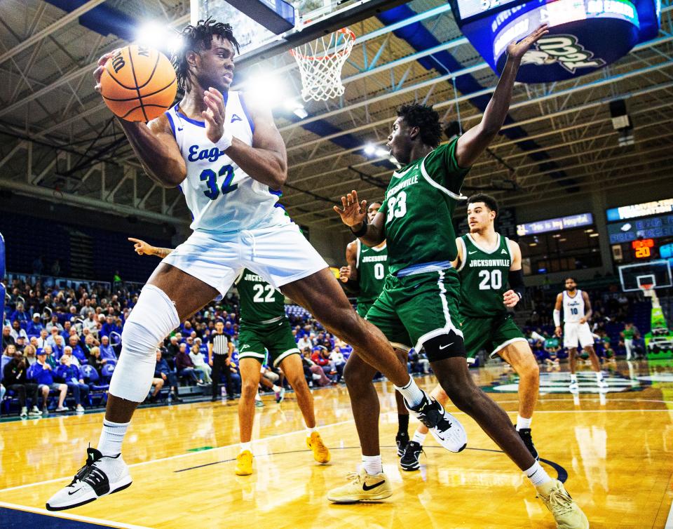 Keeshawn Kellman #32 of FGCU rebounds against Jacksonville University during a game at Alico Arena on Thursday, Jan. 4, 2024. FGCU won 80-70.