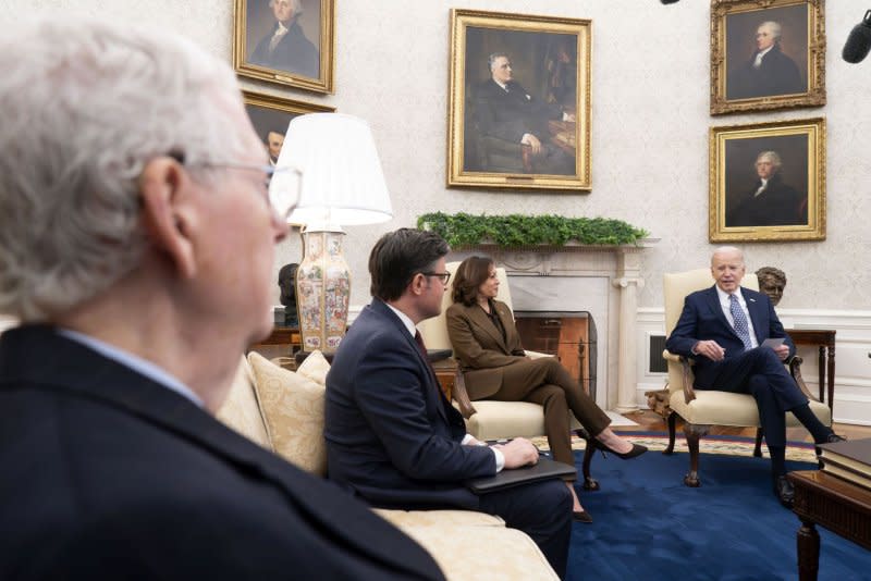 Senate Minority Leader Mitch McConnell, R-Ky. (L to R), Speaker of the House Mike Johnson, R-La., and Vice President Kamala Harris look on as President Joe Biden (R) speaks during a meeting with congressional leaders in the Oval Office of the White House in Washington, D.C., on Tuesday. Photo by Bonnie Cash/UPI