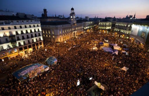 Spain's "indignant" activists converge on the Puerta del Sol square in Madrid