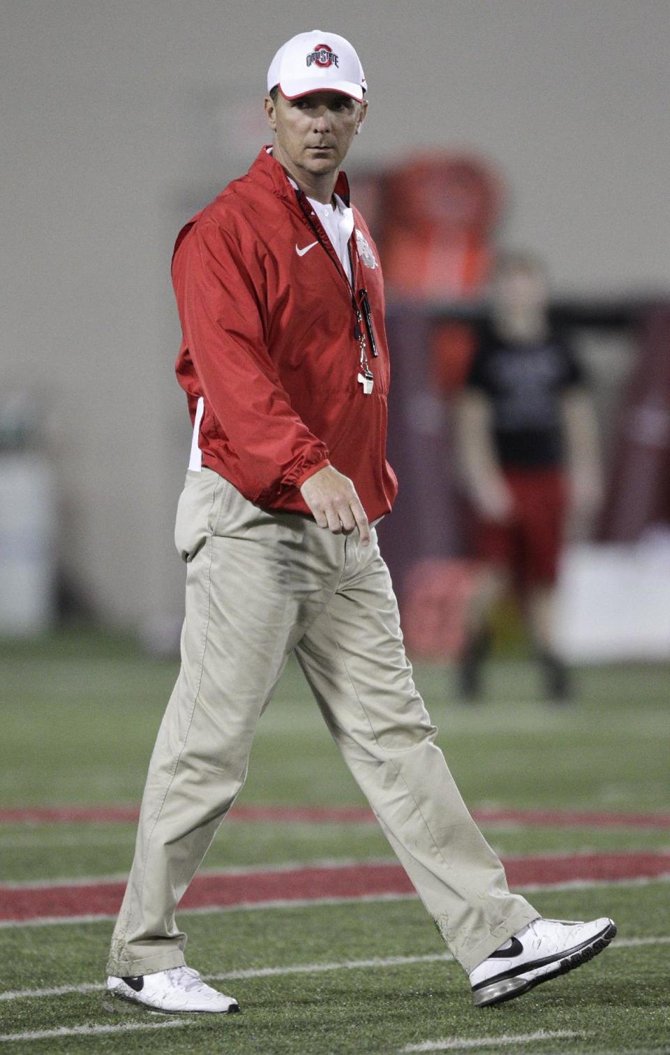 Ohio State head coach Urban Meyer watches his team during their Spring NCAA college football practice Tuesday, March 4, 2014, in Columbus, Ohio. (AP Photo/Jay LaPrete)