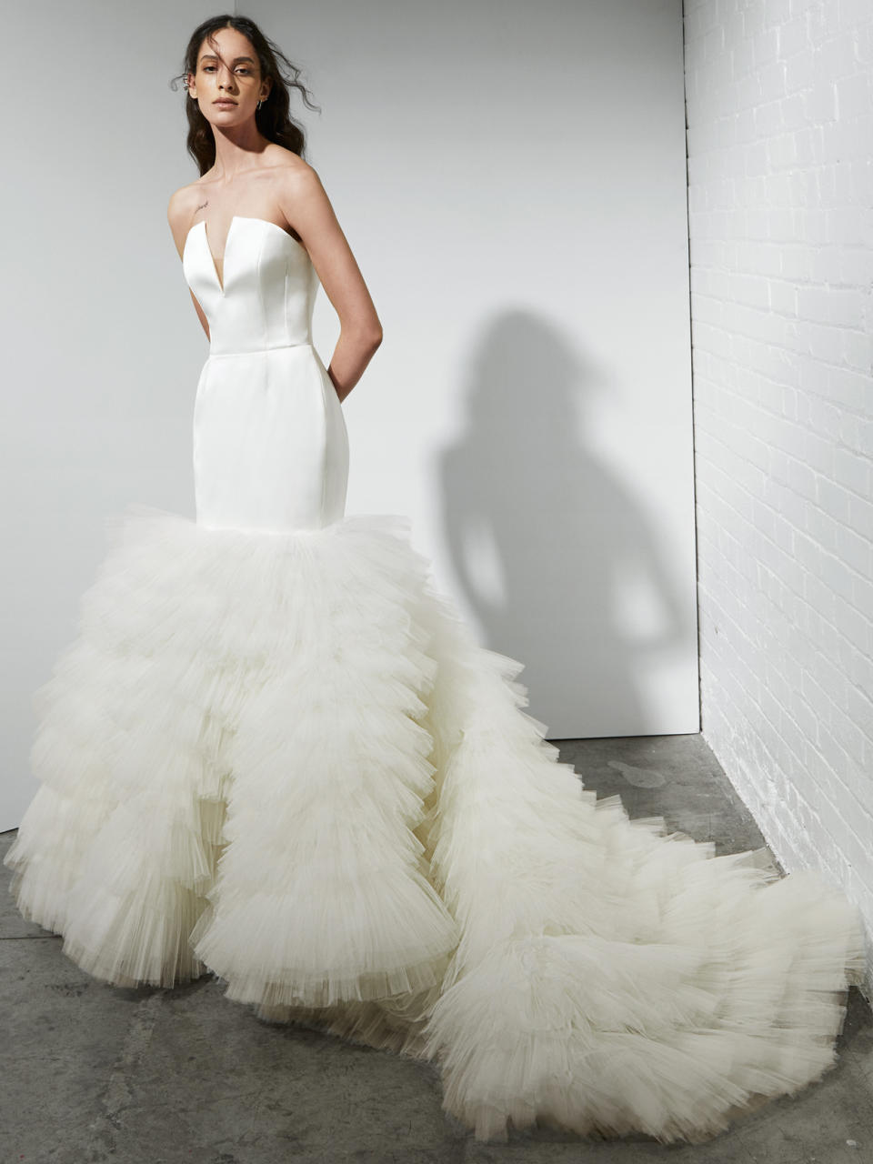 <p>Want to make a splash on your wedding day? Consider the "Ophelia," a sophisticated mermaid with a structural bodice and over-the-top ruffle skirt, from <a href="https://ritavinieris.com/" rel="nofollow noopener" target="_blank" data-ylk="slk:Rita Vinieris;elm:context_link;itc:0;sec:content-canvas" class="link ">Rita Vinieris</a>' Rivini label. Despite its voluminous lower half, it's light as a feather and perfect for dancing.</p>