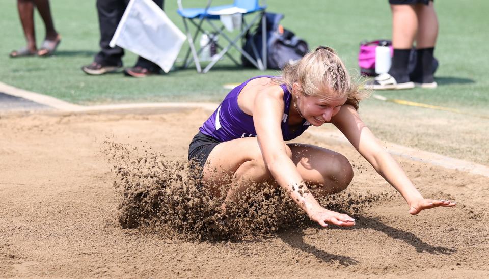 Triway's Kalie Campbell finished second in the long jump to qualify for regionals here at the Div. II Orrville District.