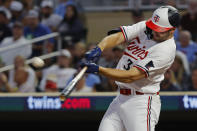 Minnesota Twins' Matt Wallner hits a grand slam against the Detroit Tigers during the sixth inning of a baseball game Tuesday, Aug. 15, 2023, in Minneapolis. (AP Photo/Bruce Kluckhohn)