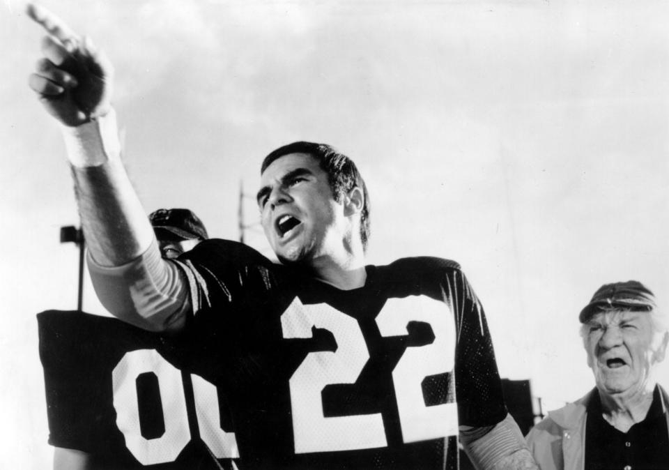 Burt Reynolds plays an incarcerated quarterback in "The Longest Yard."