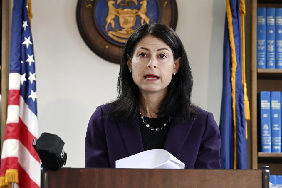 FILE - Michigan Attorney General Dana Nessel speaks during a news conference in Detroit on Oct. 14, 2021. A judge had no authority to issue indictments in the Flint water scandal, the Michigan Supreme Court said Tuesday in an extraordinary decision that wipes out charges against former Gov. Rick Snyder, his health director and seven other people. It's an astonishing defeat for Attorney General Dana Nessel, who took office in 2019. (Max Ortiz/Detroit News via AP, File)