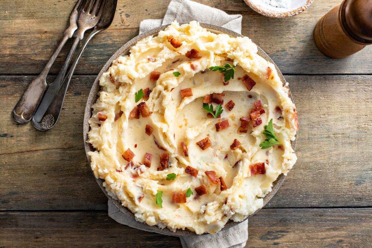 Bacon mashed potatoes with cheddar cheese and fresh parsley