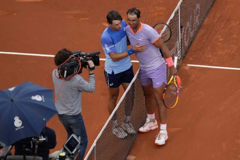 All over: Rafael Nadal with Alex De Minaur after his defeat (PAU BARRENA)