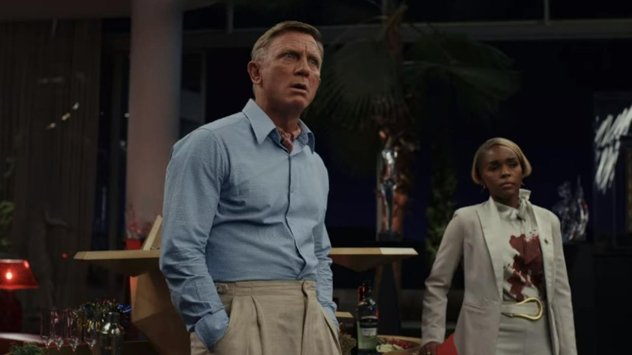  Janelle Monae and Daniel Craig in Glass Onion: A Knives Out Mystery. 