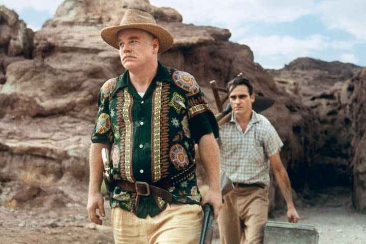 Philip Seymour Hoffman and Joaquin Phoenix walk in the desert together in The Master.
