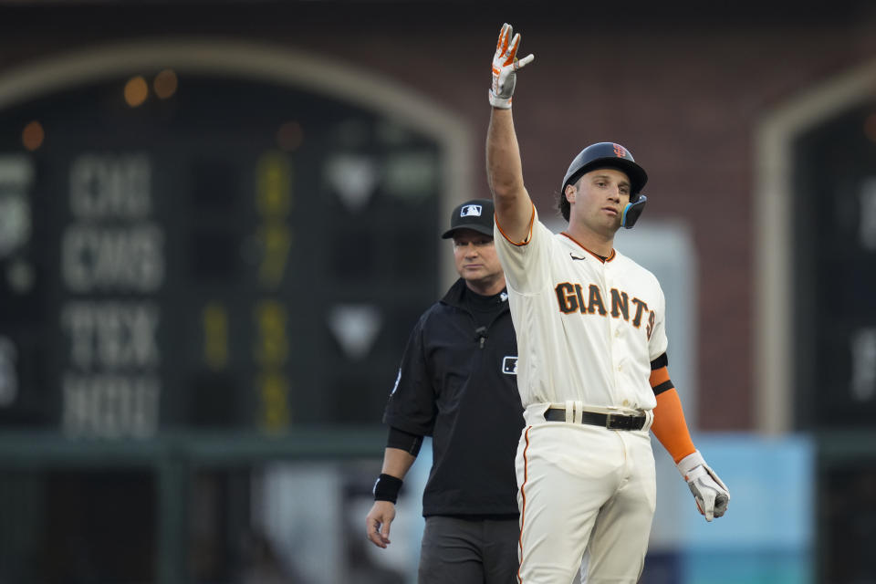 San Francisco Giants' Casey Schmitt reacts after hitting an RBI double against the Oakland Athletics during the second inning of a baseball game, Wednesday, July 26, 2023, in San Francisco. (AP Photo/Godofredo A. Vásquez)