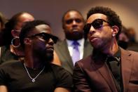 Actor Kevin Hart and musician Ludacris attend a memorial service for George Floyd following his death in Minneapolis police custody, in Minneapolis