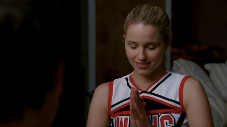 a cheerleader praying