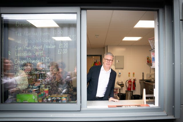 Sir Keir Starmer serves teas and coffees