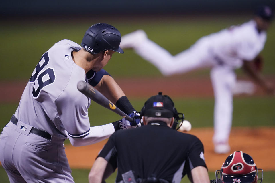 New York Yankees' Aaron Judge takes a pitch on his first inning at bat during a baseball game against the Boston Red Sox at Fenway Park, Wednesday, Sept. 14, 2022, in Boston. (AP Photo/Charles Krupa)