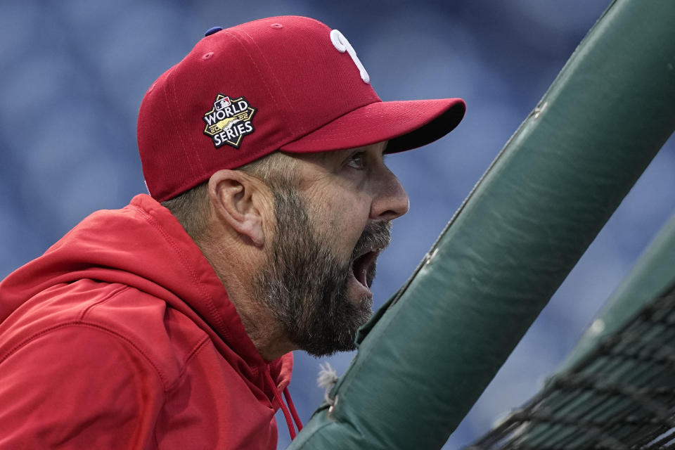 Philadelphia Phillies hitting coach Kevin Long watches during batting practice before Game 4 of baseball's World Series between the Houston Astros and the Philadelphia Phillies on Wednesday, Nov. 2, 2022, in Philadelphia. (AP Photo/David J. Phillip)