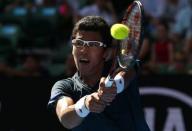 South Korea's Hyeon Chung hits a shot during his first round match against Serbia's Novak Djokovic at the Australian Open tennis tournament at Melbourne Park, Australia, January 18, 2016. REUTERS/Jason Reed