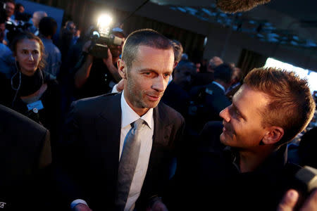 Newly elected UEFA President Aleksander Ceferin of Slovenia is congratulated after the election during the UEFA Extraordinary Congress in Athens, Greece September 14, 2016. REUTERS/Alkis Konstantinidis