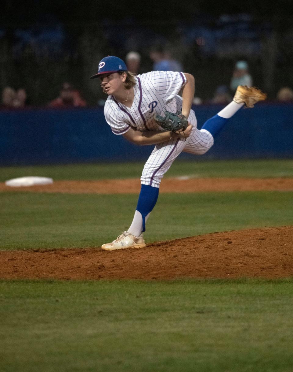 Pace High's Tanner Sauls starts the night on the hill to pitch against Tate during Friday night home game. 