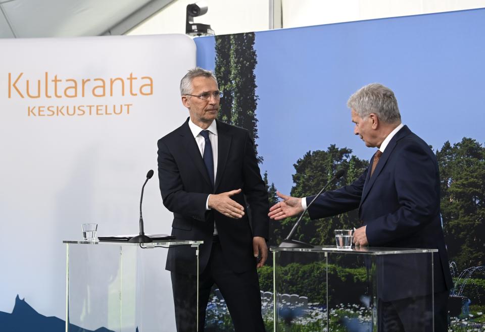 FILE - Finland's President Sauli Niinisto meets with NATO Secretary General Jens Stoltenberg, left, at the presidential summer residence Kultaranta in Naantali, Finland, on June 12, 2022. NATO Secretary-General Jens Stoltenberg said Monday, April 3, 2023 Finland will become the 31st member of the world's biggest military alliance on Tuesday, prompting a warning from Russia that it would bolster its defenses near their joint border if NATO deploys any troops in its new member. (Markku Ulander/Lehtikuva via AP, File)