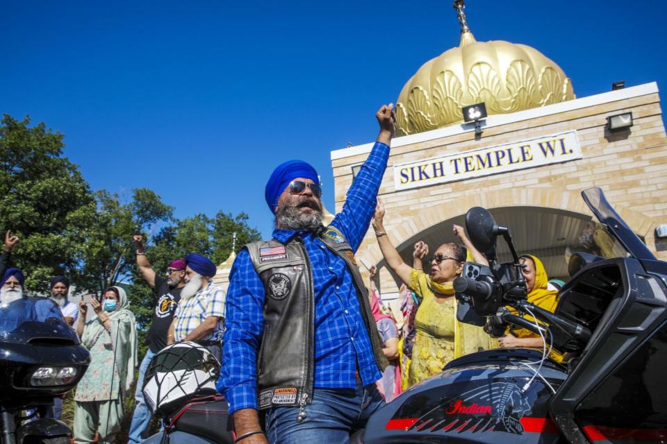 Riders led by Dilbagh Singh Sandhu are welcomed at Sikh Temple in Oak Creek