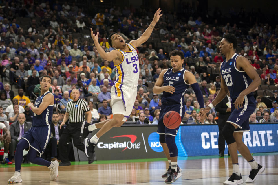 <p>LSU guard Tremont Waters (3) reacts after rebounding the ball while being defended by Yale guard Alex Copeland (3) during the second half of the first round men’s college basketball game in the NCAA Tournament, in Jacksonville, Fla. Thursday, March 21, 2019. (AP Photo/Stephen B. Morton) </p>