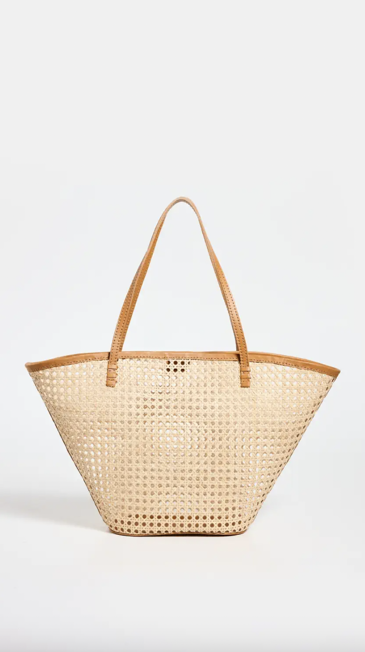 <p><a href="https://go.redirectingat.com?id=74968X1596630&url=https%3A%2F%2Fwww.shopbop.com%2Flou-tote-caramel-rattan-bembien%2Fvp%2Fv%3D1%2F1576935129.htm&sref=https%3A%2F%2Fwww.townandcountrymag.com%2Fstyle%2Ffashion-trends%2Fg60258635%2Fbest-designer-straw-bags%2F" rel="nofollow noopener" target="_blank" data-ylk="slk:Shop Now;elm:context_link;itc:0;sec:content-canvas" class="link ">Shop Now</a></p><p>Lou Tote Caramel Rattan</p><p>shopbop.com</p><p>$360.00</p>