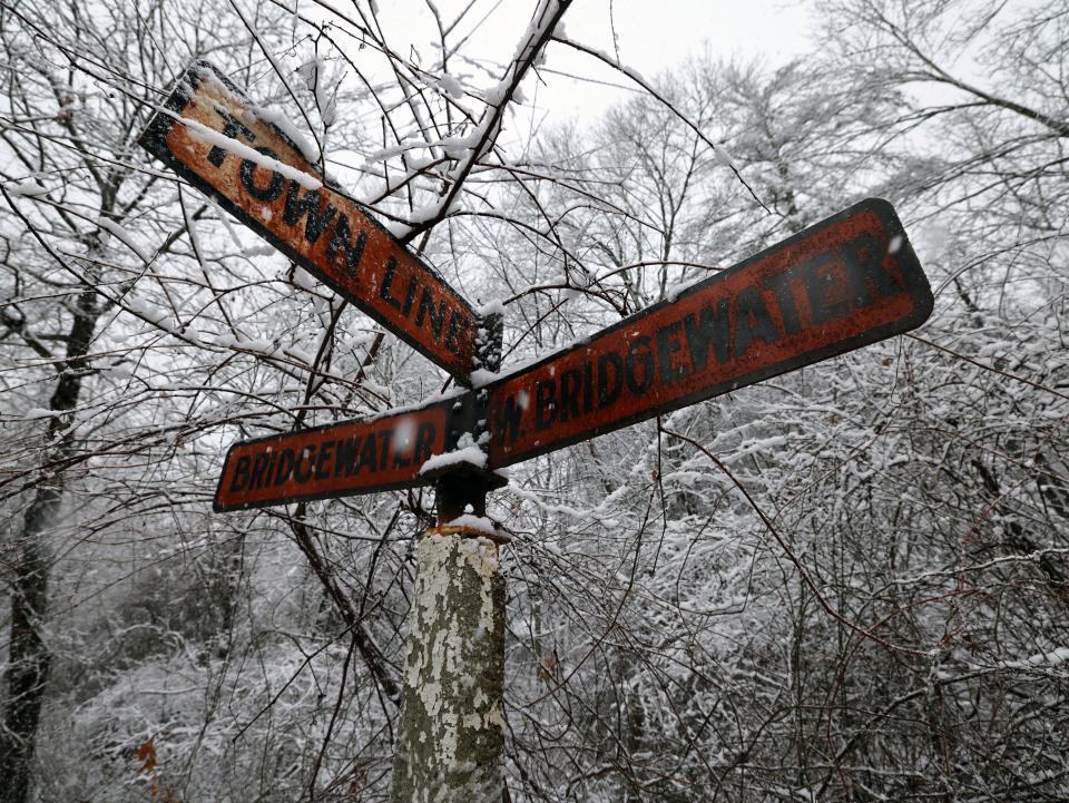 The Bridgewater-West Bridgewater town line sign can be seen on South Street during a nor'easter on Tuesday, Feb. 13, 2024.