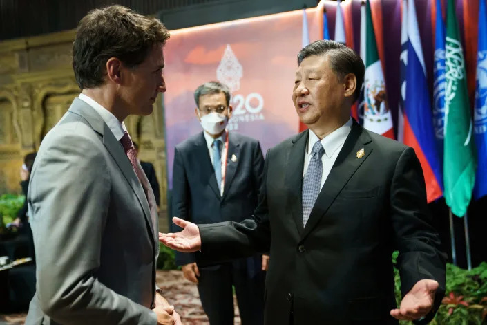 Canada's Prime Minister Justin Trudeau speaks with China's President Xi Jinping at the G20 Leaders' Summit in Bali, Indonesia, November 16, 2022. A