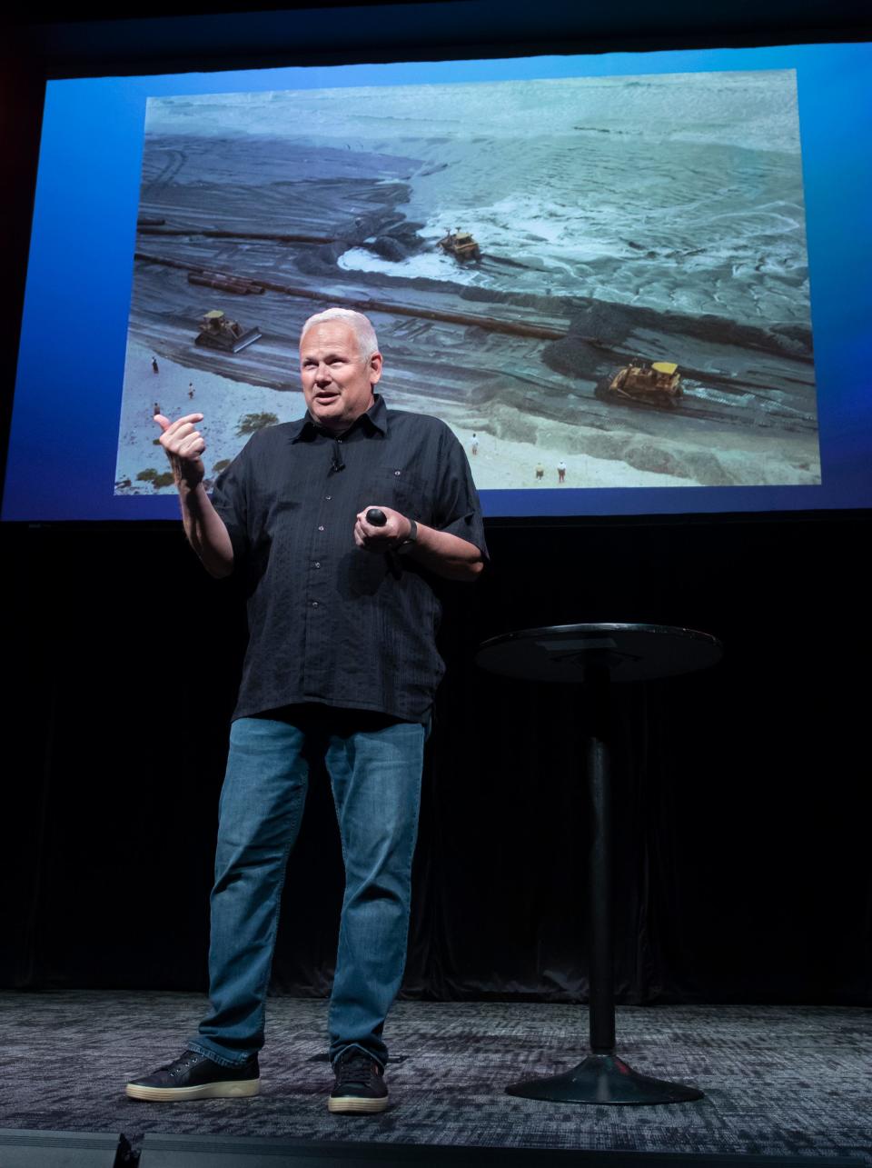 Robert Young, director of the Program for the Study of Developed Shorelines at Western Carolina University, talks Monday about communities needing to reconsider where they are investing and building along the coasts and about coastal adaptation and resilience during CivicCon at the Rex Theatre in downtown Pensacola.