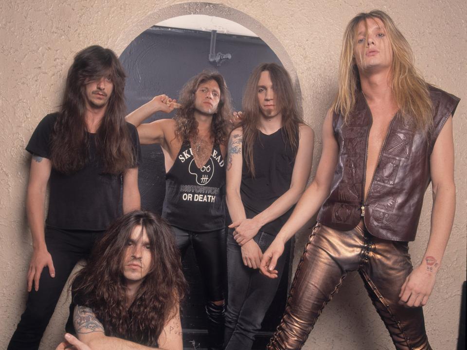 Heavy Metal group Skid Row as they pose at the Aragon Ballroom, Chicago, Illinois, February 12, 1992. Pictured are, from left, Rachel Bolan, Dave Sabo (crouching), Dave Affuso, Scotti Hill, and Sebastian Bach.