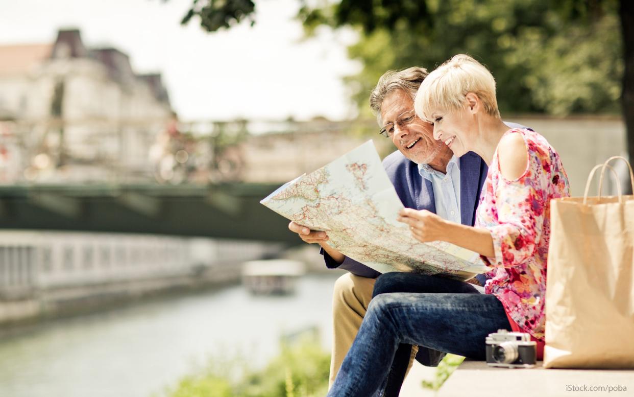 older couple looking at a map