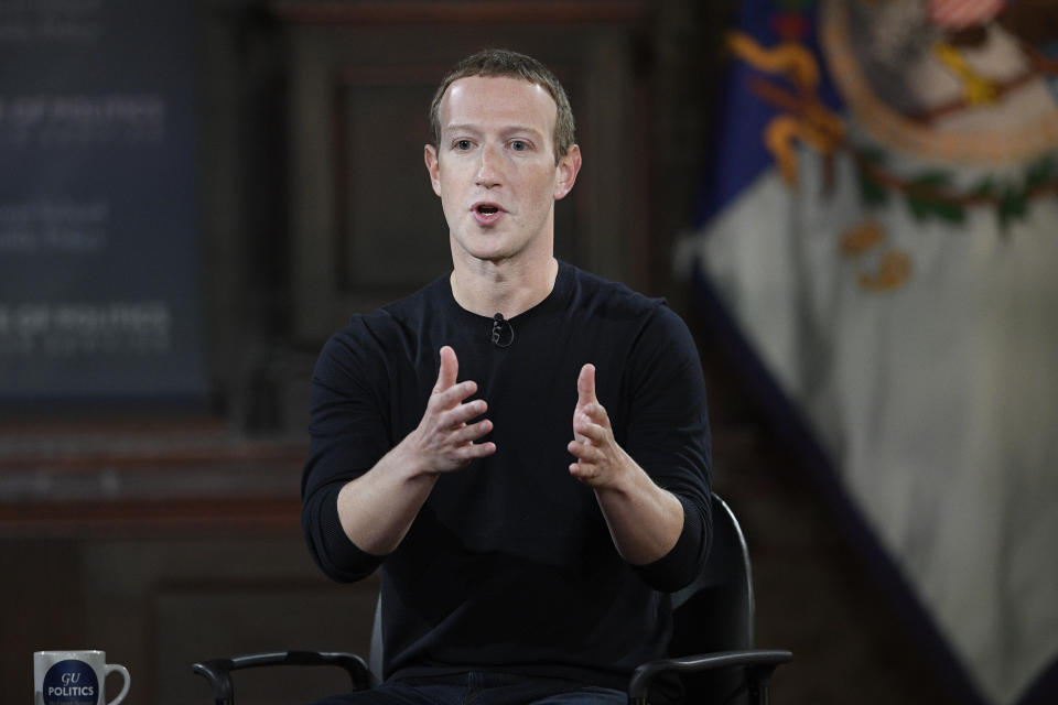 FILE - In this Thursday, Oct. 17, 2019, file photo, Facebook CEO Mark Zuckerberg speaks at Georgetown University, in Washington. Florida lawmakers, including Gov. Ron DeSantis, intensified their battle with Facebook, Twitter and Silicon Valley when they announced new proposals Tuesday, Feb. 2, 2021, aimed at reigning in platforms they accuse of squelching the free speech of conservatives. On a call with analysts the week before, Zuckerberg said the social media giant was attempting to “turn down the temperature and discourage divisive conversations and communities." (AP Photo/Nick Wass, File)