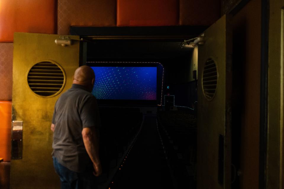 Alan Bradshaw, owner, gazes into the theater at the Ritz Theater in Tooele on June 9, 2023. | Ryan Sun, Deseret News