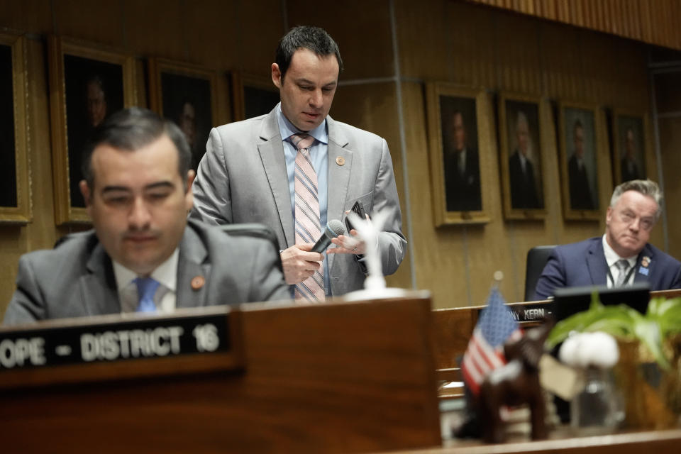 Arizona state senator J. D. Mesnard, R-District 13, plays audio of a heart beat from his cell phone, Wednesday, May 1, 2024, at the Capitol in Phoenix. (AP Photo/Matt York)