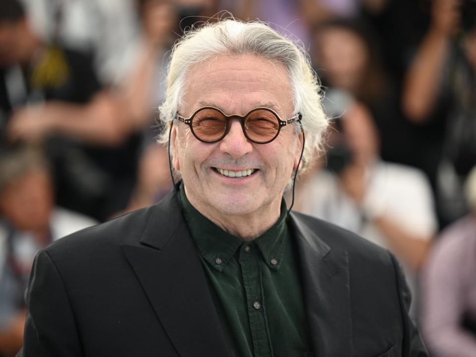 George Miller attends the photocall for "Three Thousand Years Of Longing (Trois Mille Ans A T'Attendre)" during the 75th annual Cannes film festival at Palais des Festivals on May 21, 2022 in Cannes, France