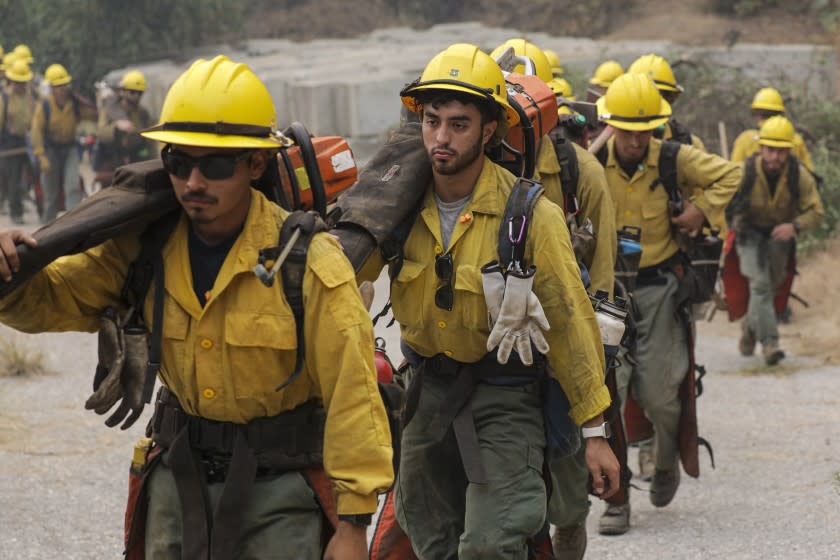 ARCADIA, CA - SEPTEMBER 15: Angeles National Forest fire crew on their way to create fire line as Bobcat fire continues to burn above Arcadia in Chantry Flat Angeles National Forest on Tuesday, Sept. 15, 2020 in Arcadia, CA. (Irfan Khan / Los Angeles Times)