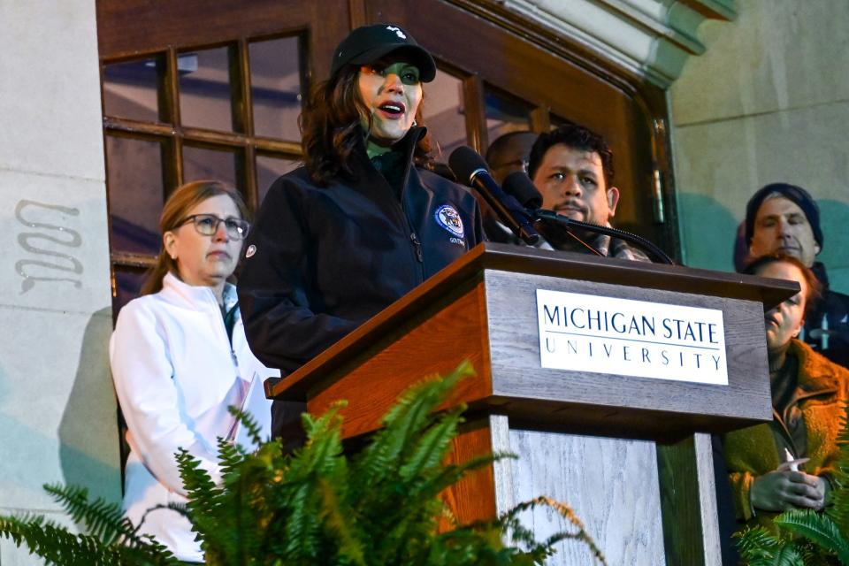 Gov. Gretchen Whitmer speaks at Michigan State University on Wednesday, Feb. 15, 2023, during a candlelight vigil honoring the victims of Monday’s mass shooting on campus.