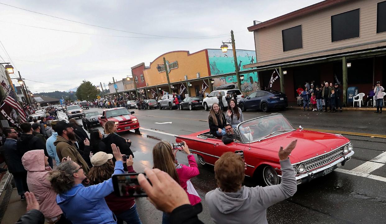FILE IMAGE: Friends and family line Bay Street as the South Kitsap Class of 2022 Senior Parade travels through downtown Port Orchard on Friday, June 10, 2022.