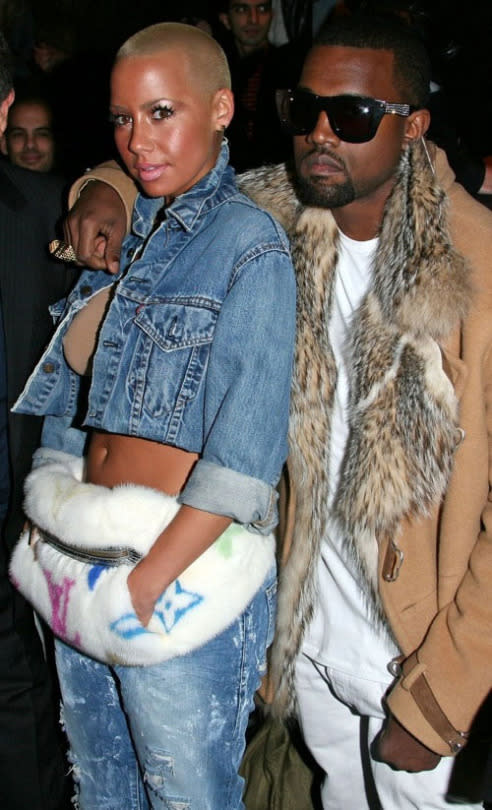 <p>Before Kim, Kanye took Amber Rose with him to Paris Fashion Week. She added some French flair to her Canadian tuxedo with the Louis Vuitton Monogram Mink Bum Bag and Kanye West wore Lanvin Way Shiner Sunglasses with a suede and fox fur coat. Ah, young love.</p>