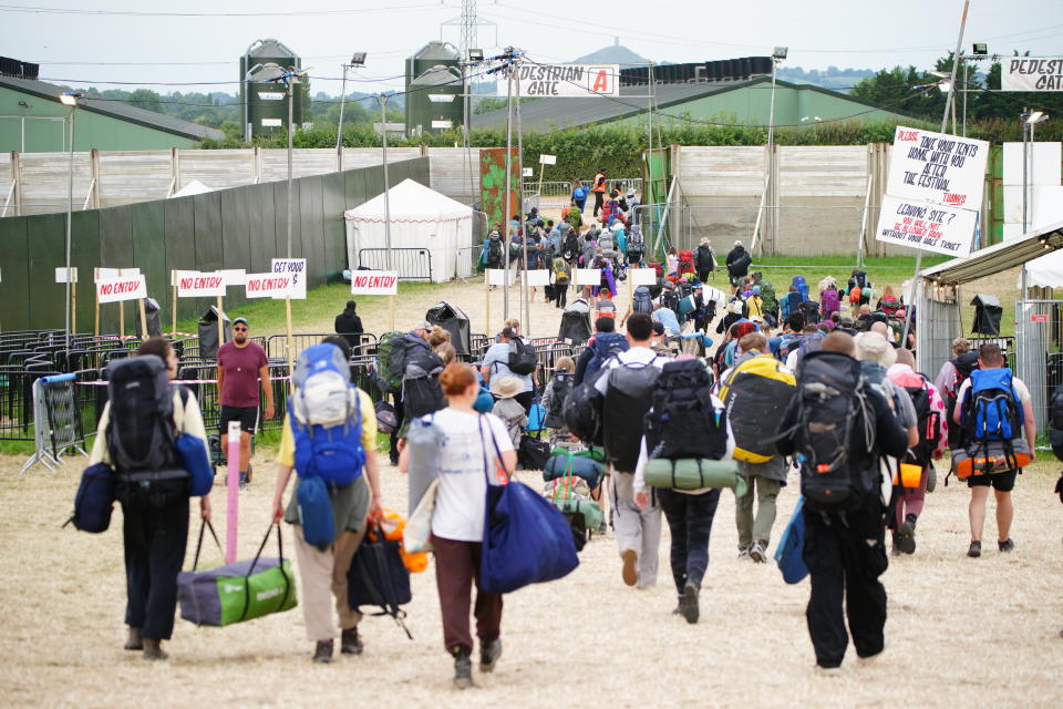Festival-goers leaving at the end of the Glastonbury Festival at Worthy Farm in Somerset. Picture date: Monday July 1, 2024. (Photo by Ben Birchall/PA Images via Getty Images)