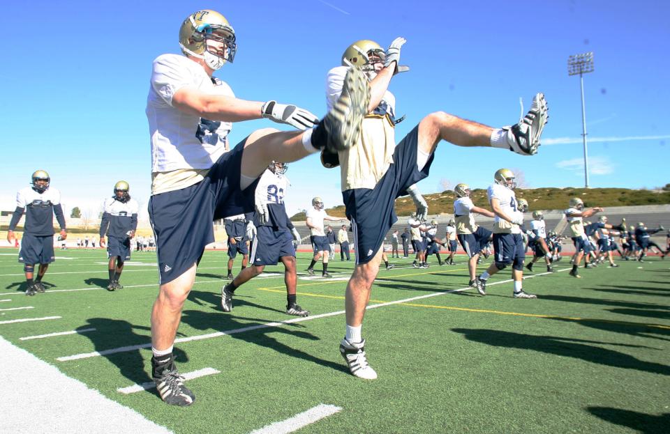 Pitt players, including tight end John Pelusi, center, go through conditioning drills in December 2008 at the Socorro Student Activities Complex.