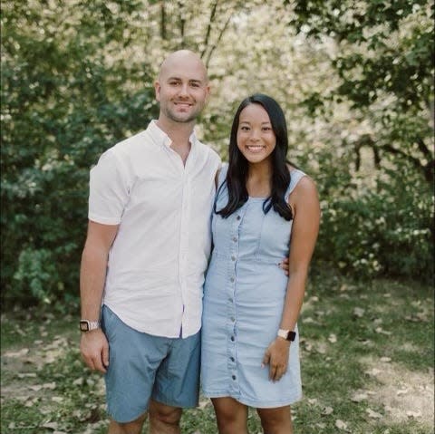 Former Gov. Robert Ray's grandson Jeffrey Newland and Jasmine Vong, the daughter of Tai Dam refugees, wed in an August ceremony at the Greater Des Moines Botanical Garden.