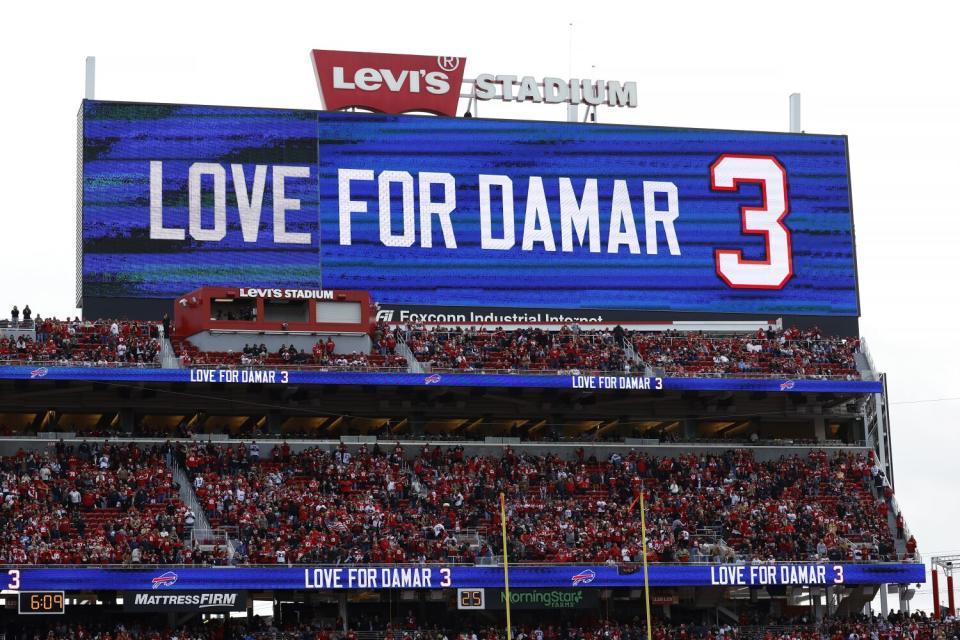 A video board at Levi's Stadium shows a message of support for Bills safety Damar Hamlin.