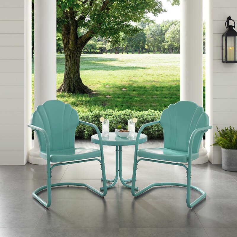 You're going to need somewhere to sit outside, and this small seating set can go from a 9-to-5 to happy hour. <a href="https://fave.co/35tCFy9" target="_blank" rel="noopener noreferrer">Find the set of chairs and side table for $176 at Wayfair</a>.