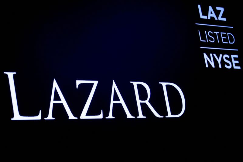 FILE PHOTO: The logo and trading information for Lazard Ltd appear on a screen on the floor at theNYSE in New York