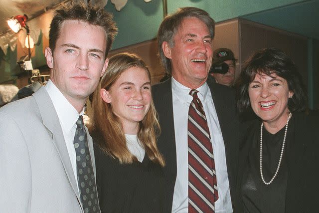 <p>Bei/Shutterstock</p> Matthew Perry with sister Maria, dad John Bennett and stepmom Debbie Perry