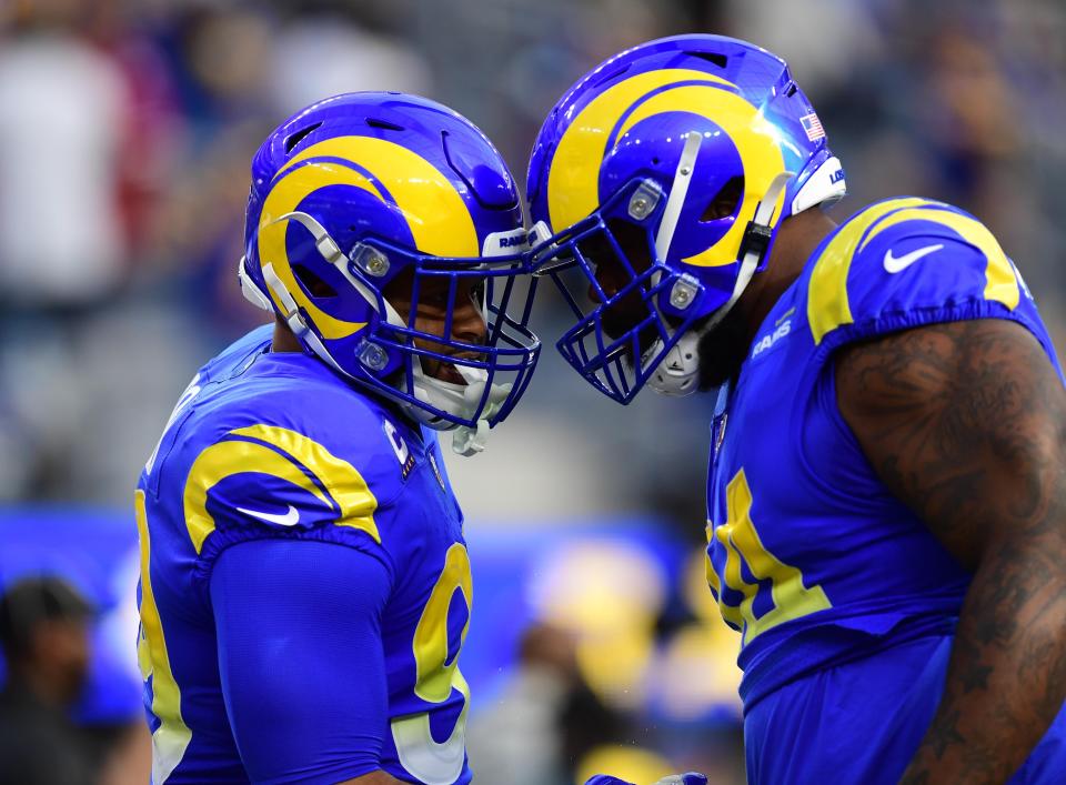 Rams defensive linemen Aaron Donald, left, and A'Shawn Robinson before the NFC championship game against the 49ers at SoFi Stadium, Jan. 30, 2022.