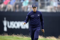 Matthew Fitzpatrick, of England, reacts after putting on the 18th hole during the third round of the U.S. Open golf tournament at The Country Club, Saturday, June 18, 2022, in Brookline, Mass. (AP Photo/Charlie Riedel)