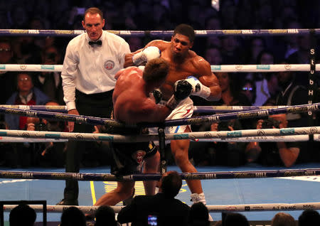 Boxing - Anthony Joshua v Alexander Povetkin - WBA Super, IBF, WBO & IBO World Heavyweight Titles - Wembley Stadium, London, Britain - September 22, 2018 Anthony Joshua in action against Alexander Povetkin Action Images via Reuters/Peter Cziborra