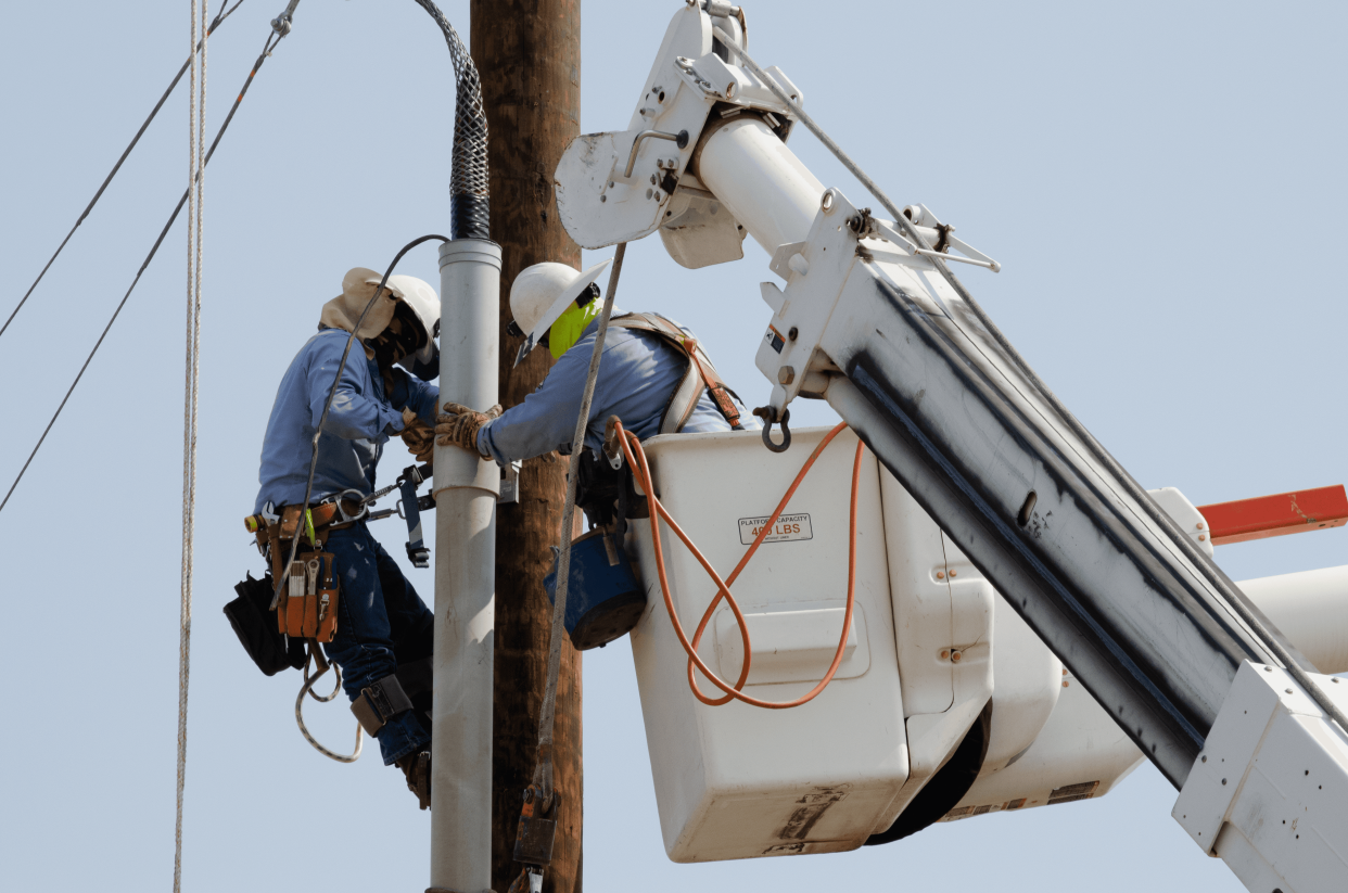 El Paso Electric crews on Monday, Aug. 24, 2020, fix power lines and poles damaged in a storm the night before. A power outage impacted thousands of customers in Las Cruces and Doña Ana.